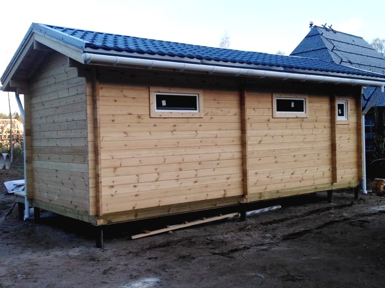 Летний дом из бруса с большой верандой - фото 8