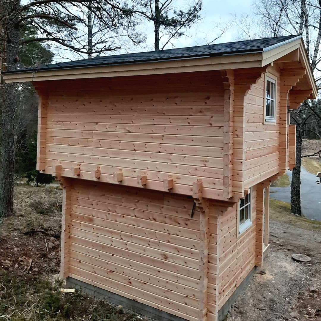Необычный деревянный домик для дачи - фото 3