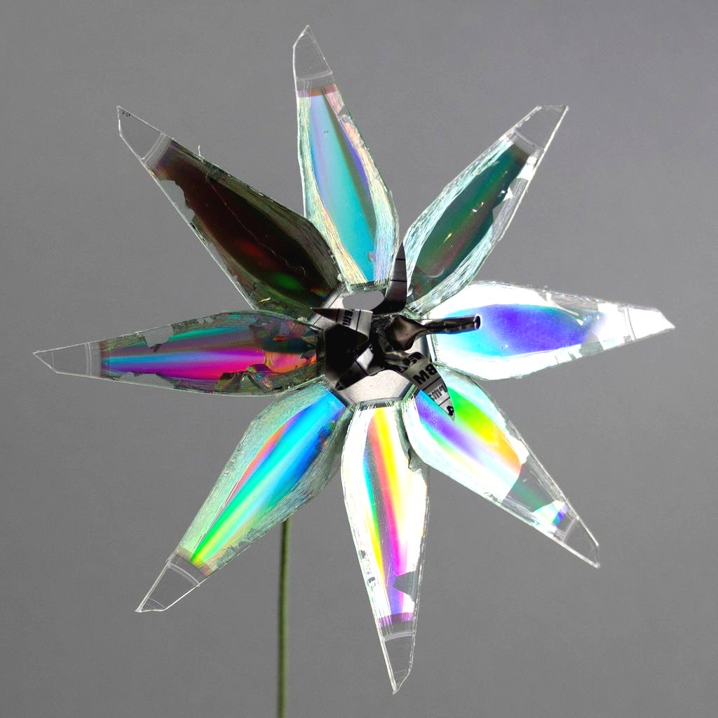 Что можно сделать из старых компьютерных дисков своими руками? - фото 9