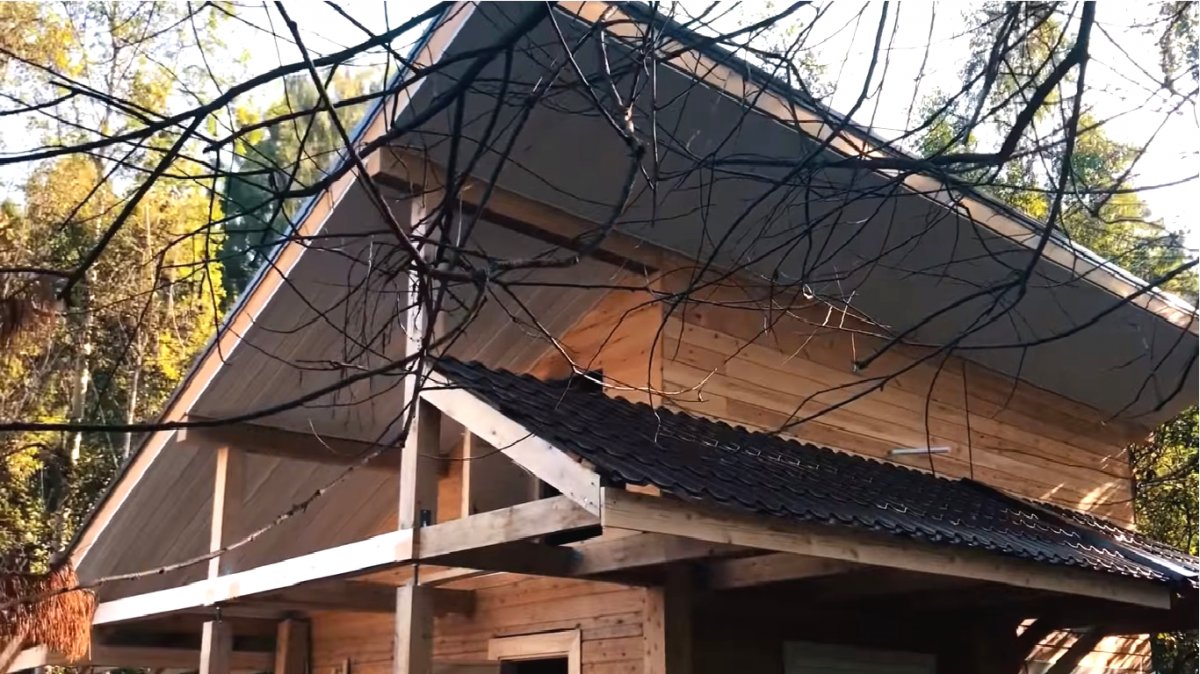 Оригинальная баня из бруса - фото 20