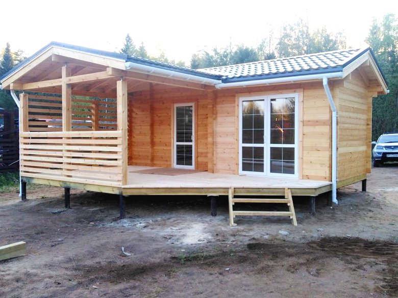 Летний дом из бруса с большой верандой - фото 2