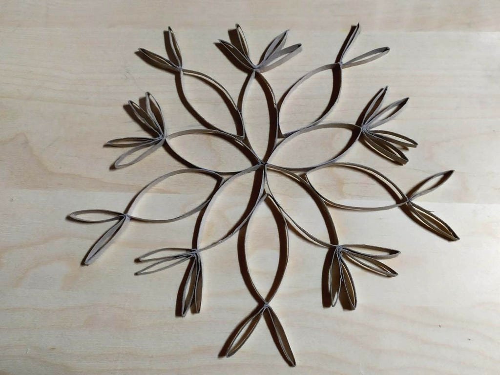 Снежинки из бумаги своими руками - фото 14