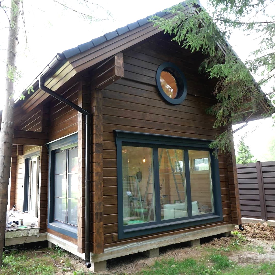 Интересный деревянный дом из бруса - фото 9