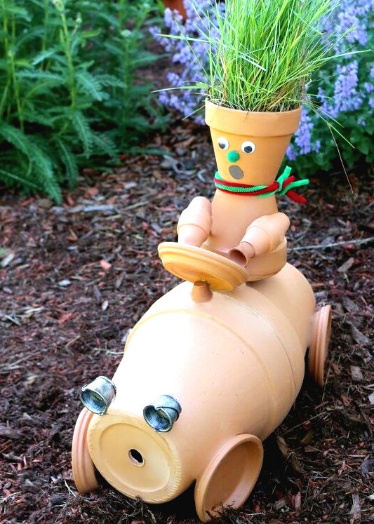 Оригинальная фигура из цветочных горшков - фото 11