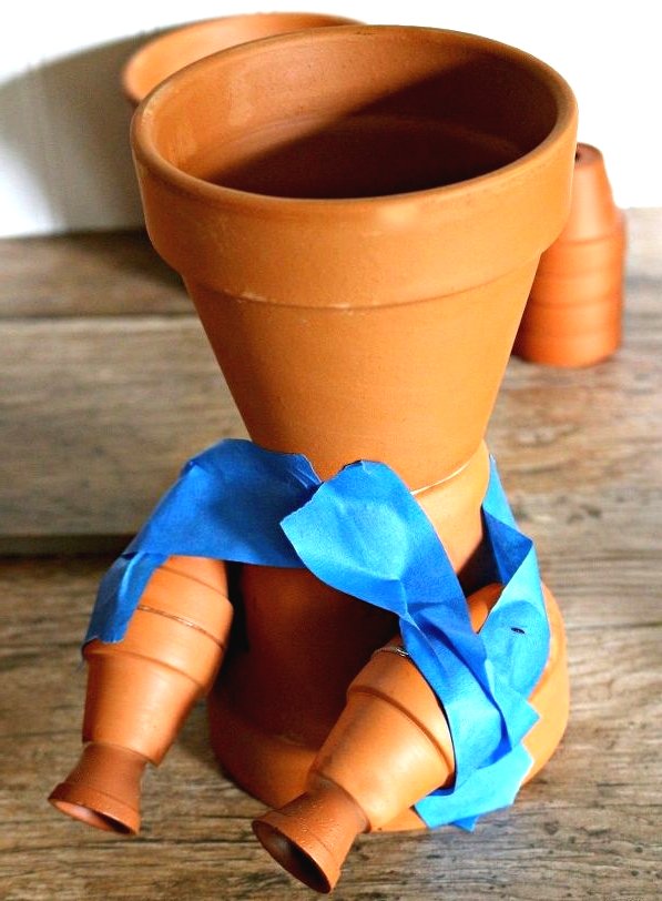 Оригинальная фигура из цветочных горшков - фото 6