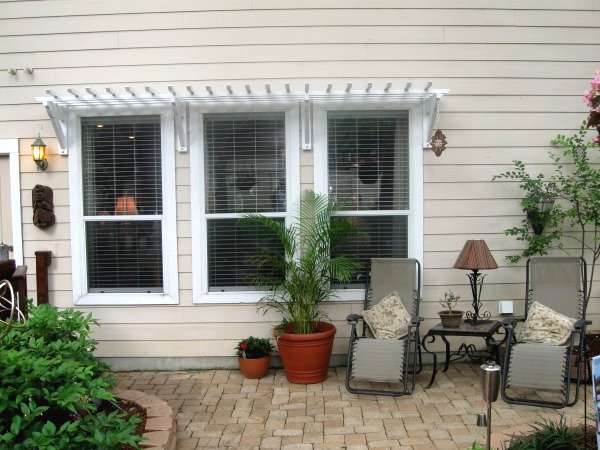 Оригинальный навес из дерева - фото 6