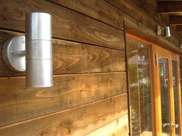 Необычный дом с изогнутой крышей - фото 19