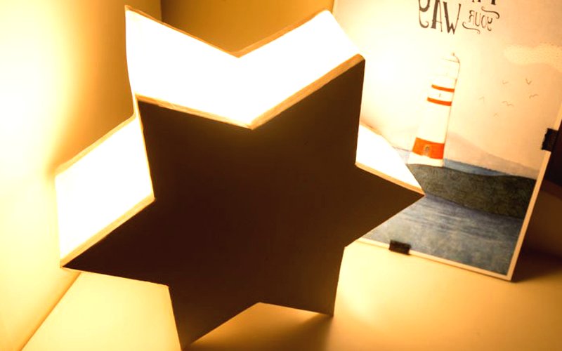Декоративная лампа в форме звезды - фото
