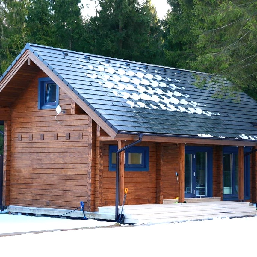 Интересный деревянный дом из бруса - фото 7