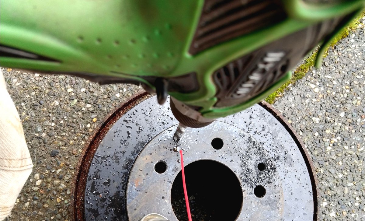 Как из старых автомобильных дисков собрать уличный очаг - фото 11