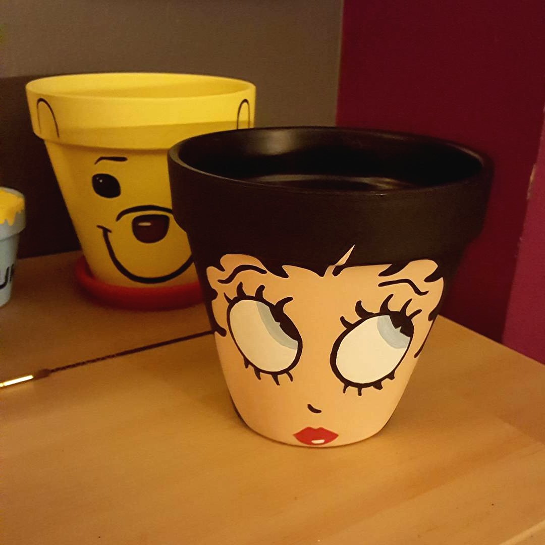 Необычные фигурки из цветочных горшков - фото 6