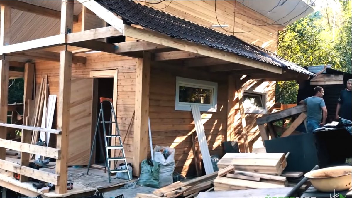 Оригинальная баня из бруса - фото 19