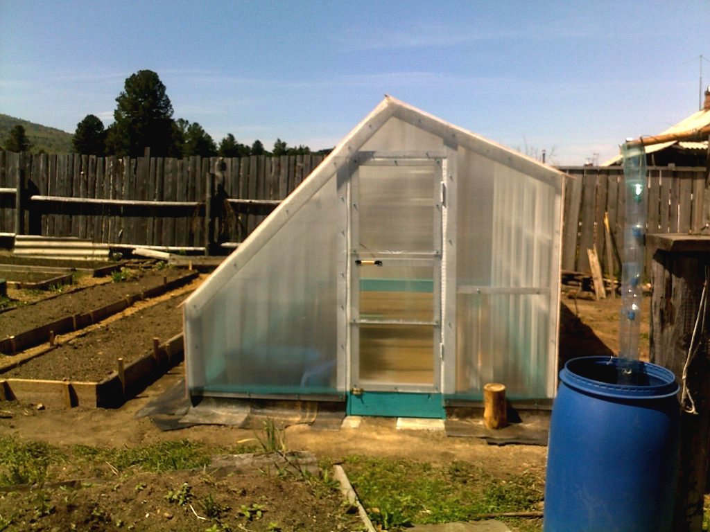 Интересная теплица из поликарбоната - фото 16