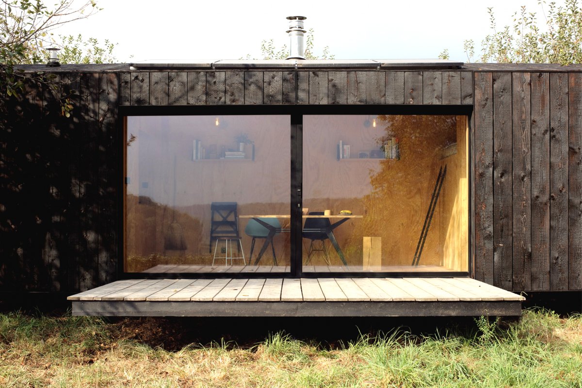 Небольшой одноэтажный дом в 22 кв м из дерева - фото 3