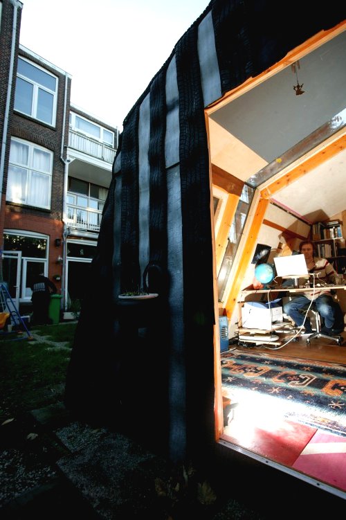 Дом из автопокрышек - фото 9