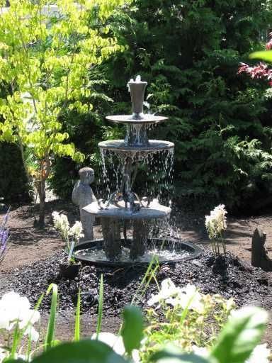 Как сделать трехуровневый садовый фонтан - фото
