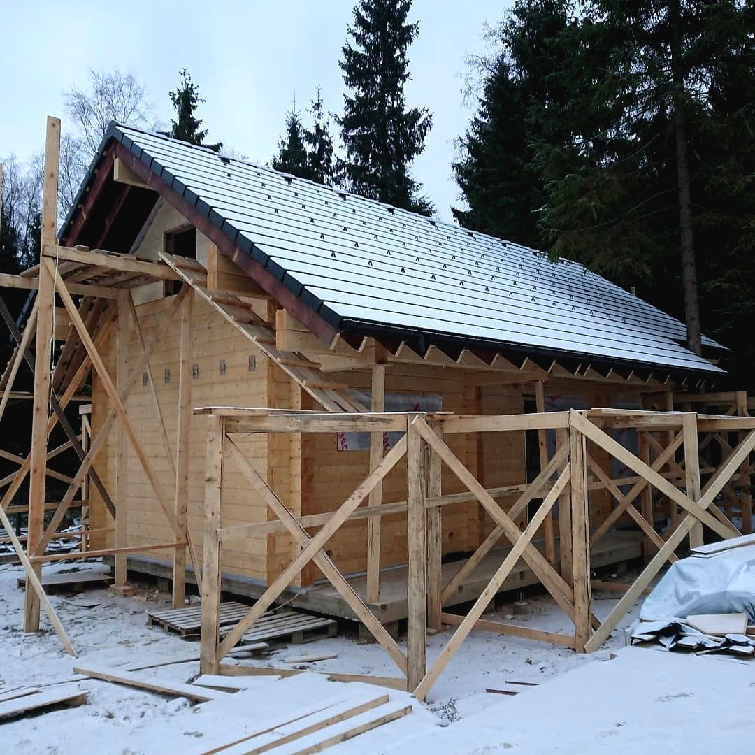 Интересный деревянный дом из бруса - фото 5