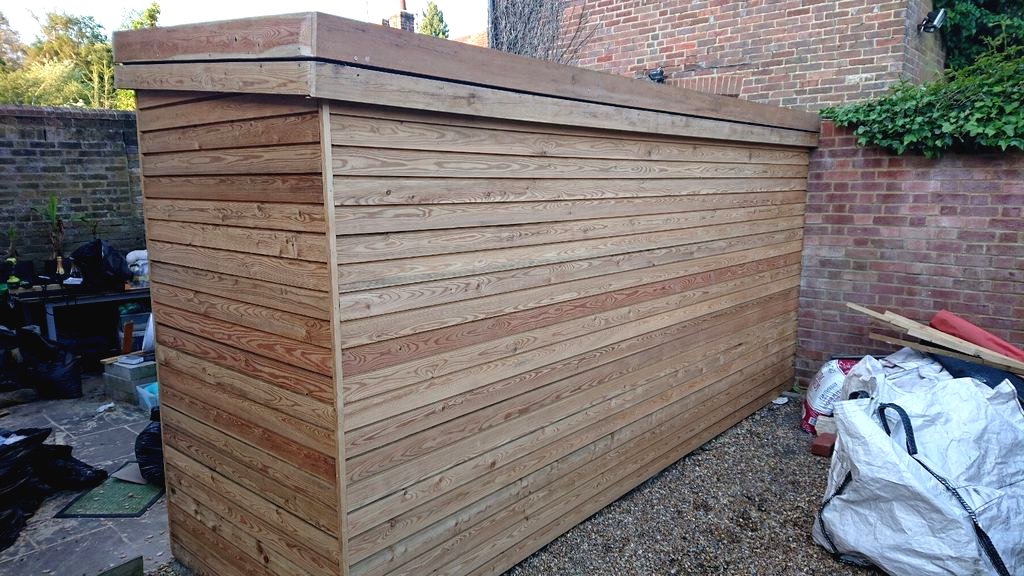 Современный сарай из дерева - фото 21