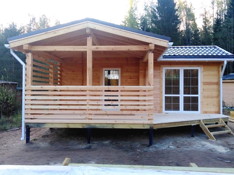 Летний дом из бруса с большой верандой - фото 3