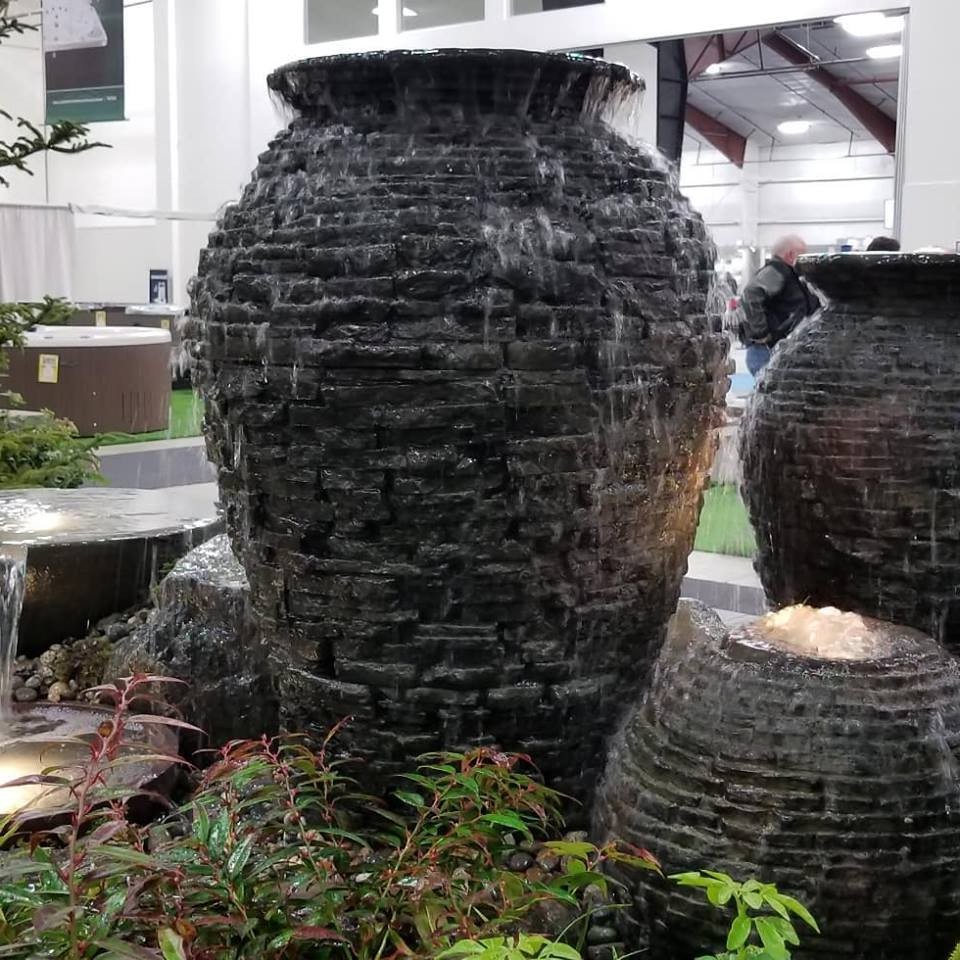 Оригинальный фонтан из каменных ваз - фото 11