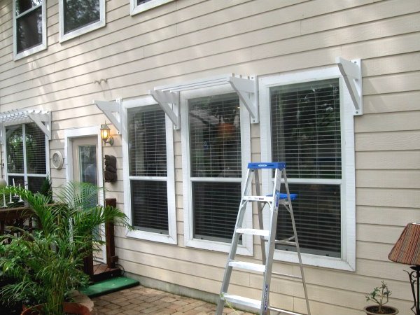 Оригинальный навес из дерева - фото 4