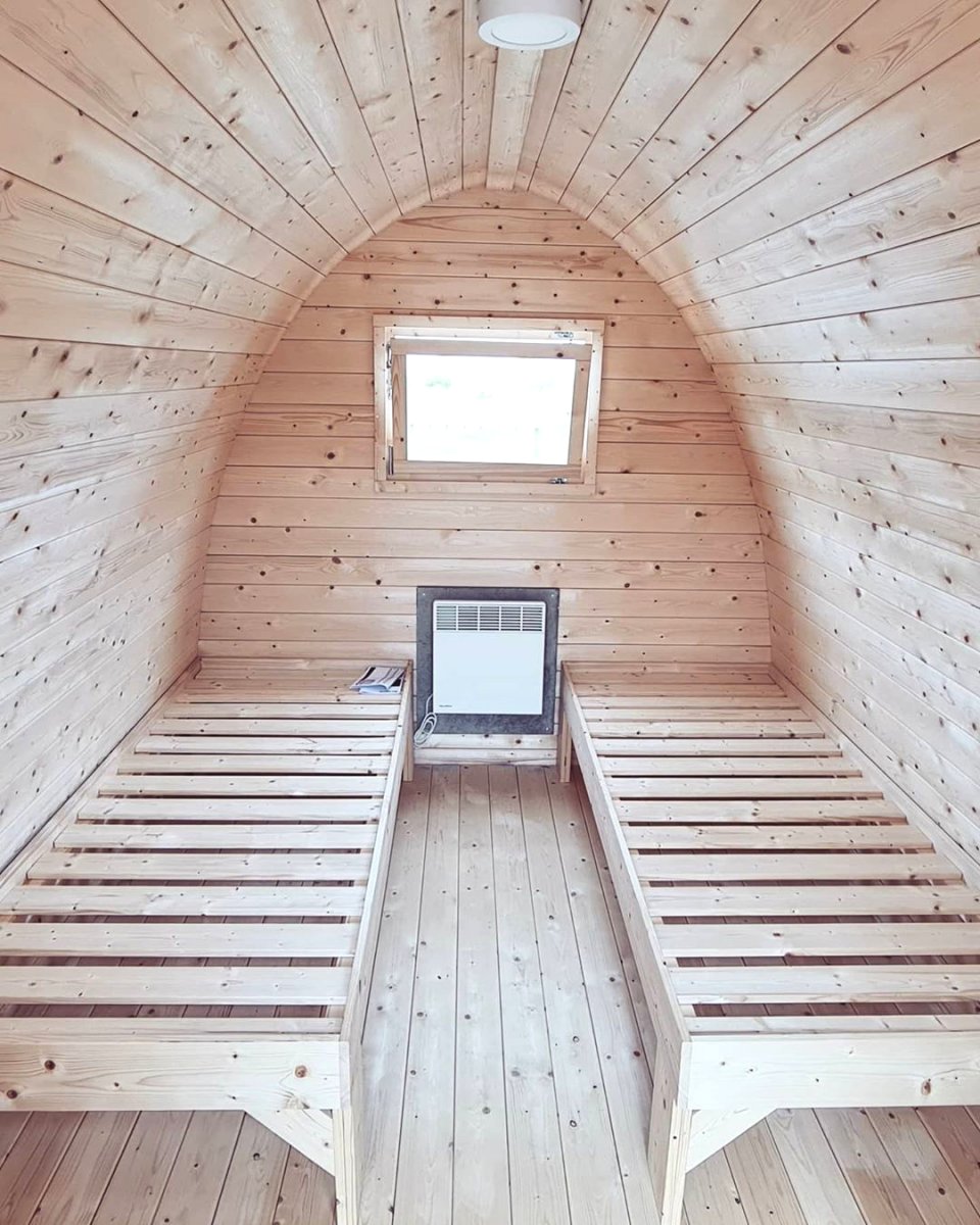 Оригинальный дачный домик из сосны - фото 3