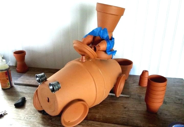 Оригинальная фигура из цветочных горшков - фото 10