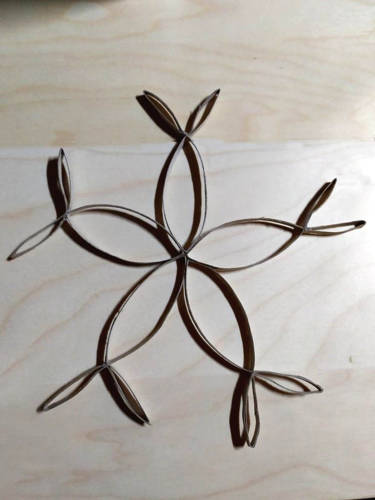 Снежинки из бумаги своими руками - фото 11