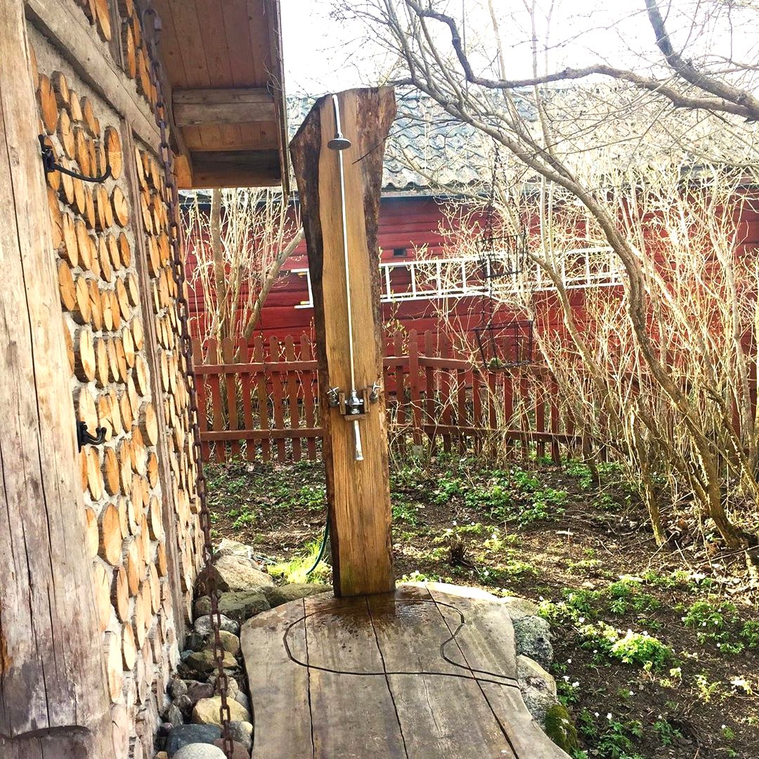 Необычная баня из бревен - фото 24