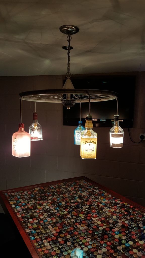 Люстра из велосипедного колеса и бутылок - фото 16