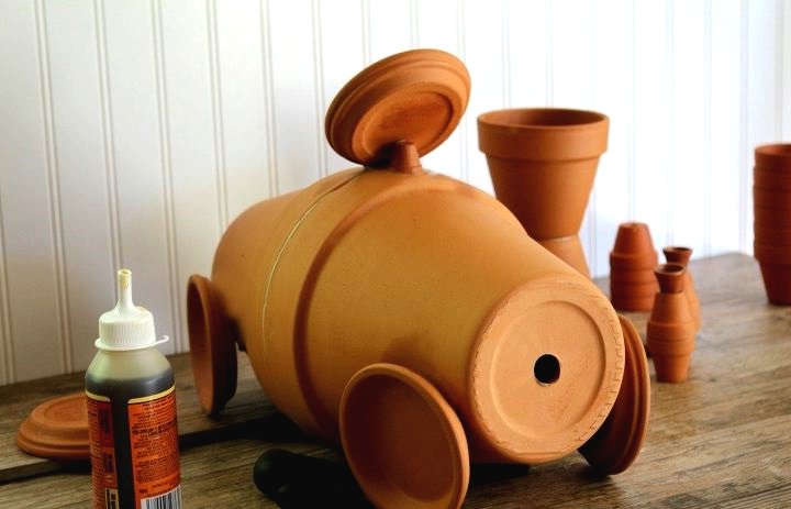 Оригинальная фигура из цветочных горшков - фото 8