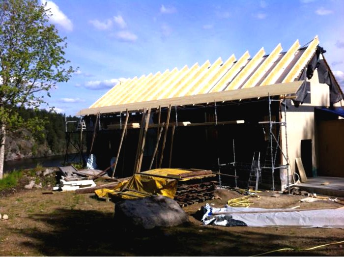 Необычный дом с видом на озеро - фото 14