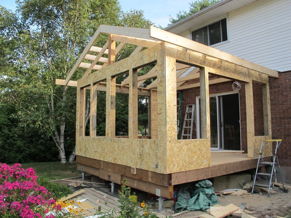 Закрытая солнечная веранда с дровяной печью - фото 15