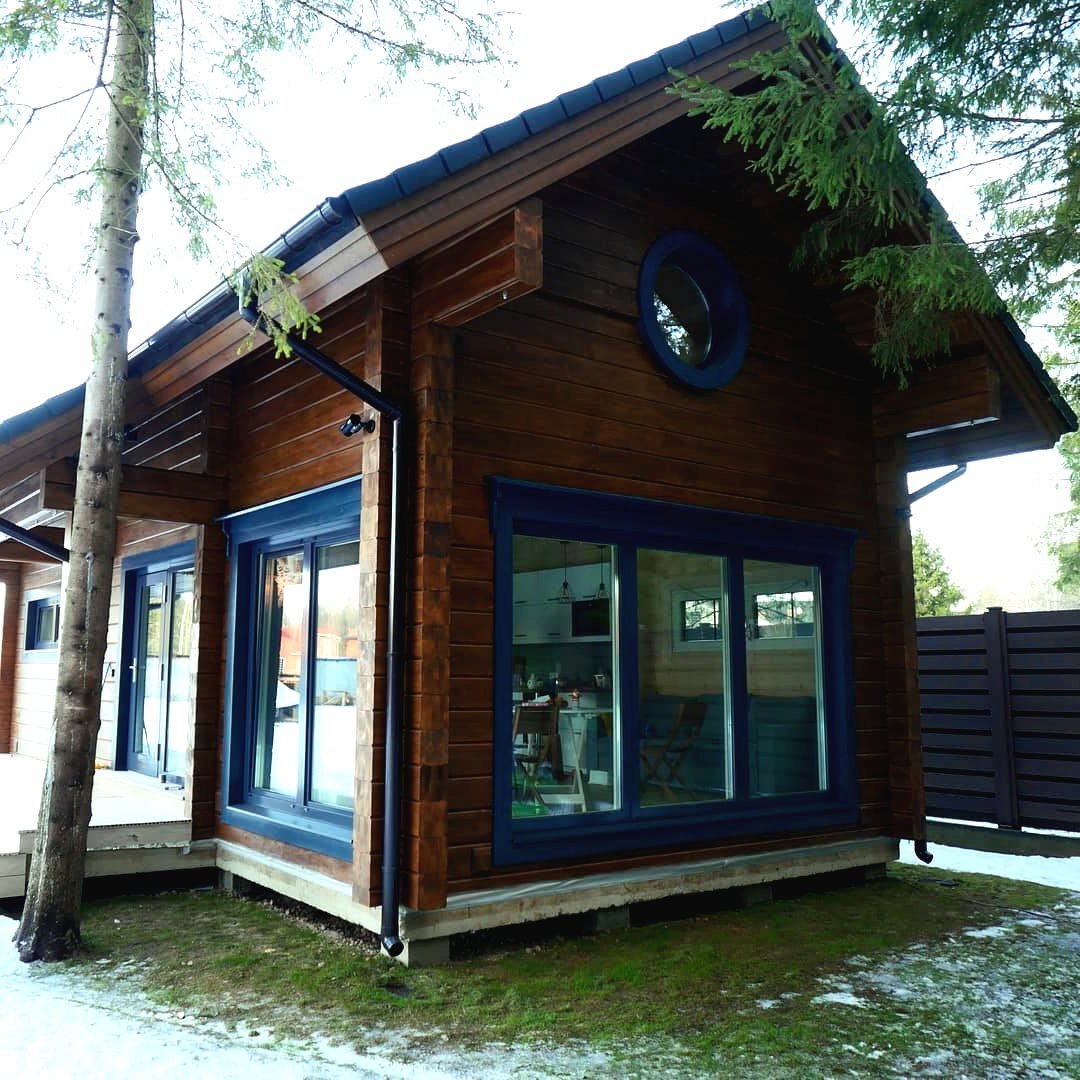 Интересный деревянный дом из бруса - фото 8