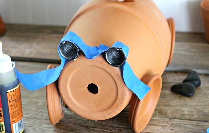 Оригинальная фигура из цветочных горшков - фото 9