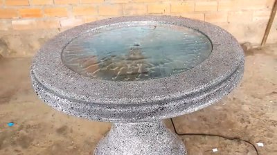 Садовый фонтан с имитацией под гранитный камень